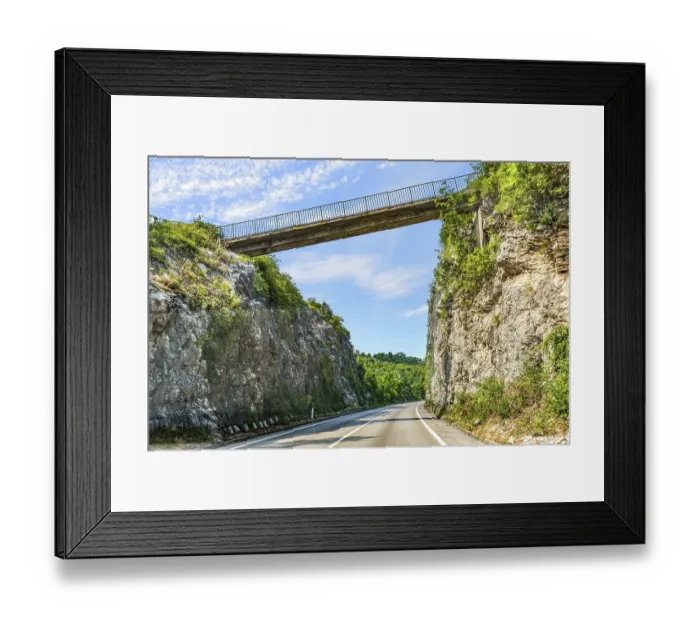 Framed Print : Road through mountains under connecting bridge in Montenegro
