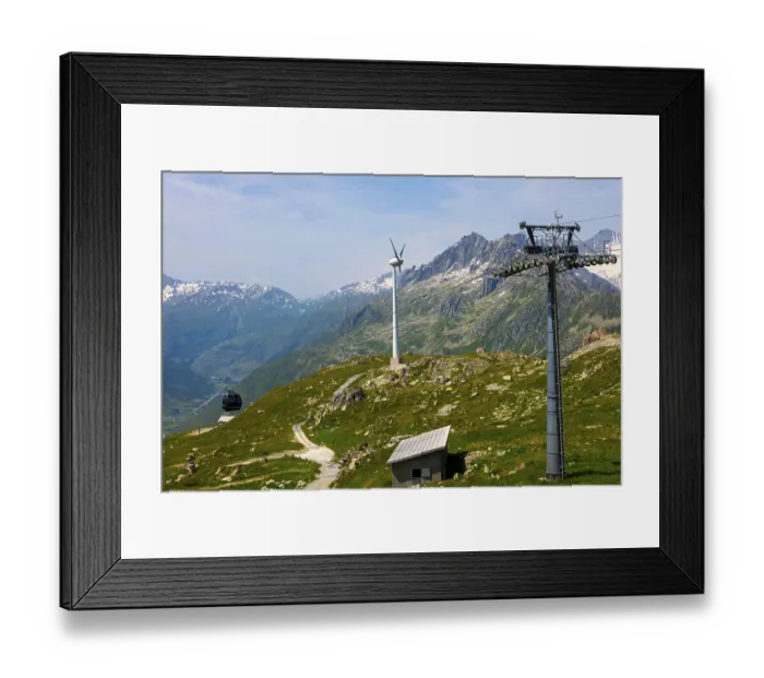 Framed Print : Wind Turbine and Mountain with Glacier and Overhead Cable Car and Blue Sky