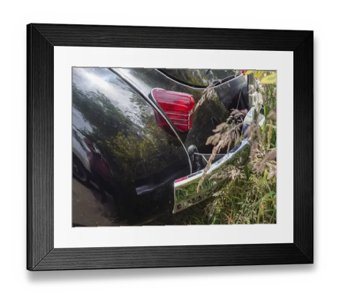 Framed Print : Rear view of a black vintage car