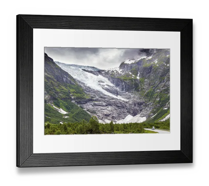Framed Print : Huge glacier slides down the pass into the valley