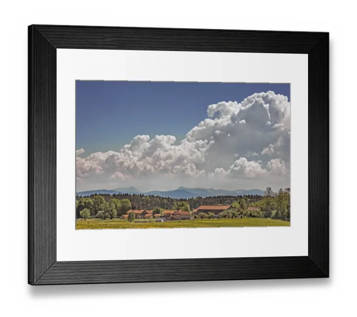 Framed Print : Cluster clouds (cumulus) over Alpine chain near Munich