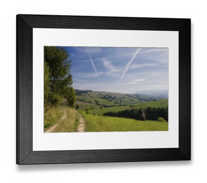 Framed Print : Purity of the sky with airplane's track and road in field Purity of the sky with airplane's track