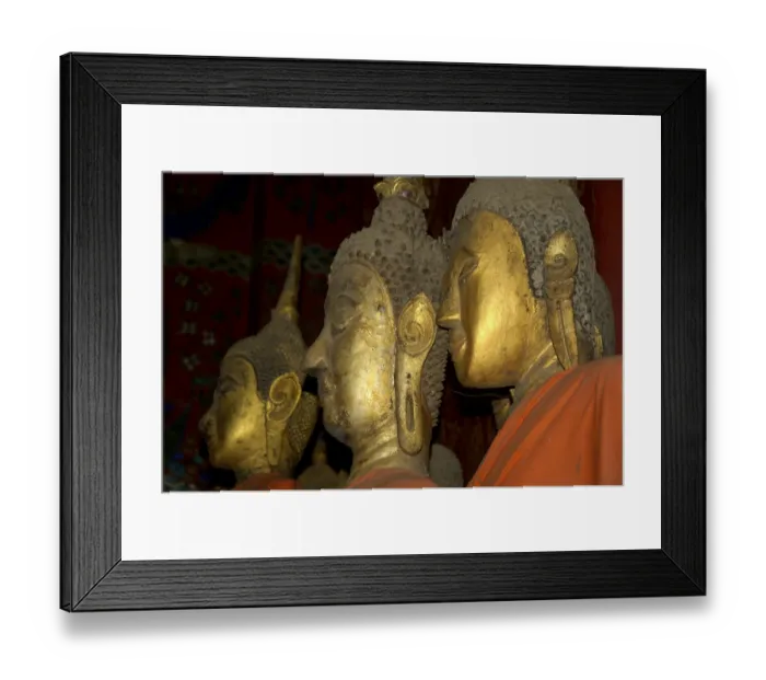 Framed Print : Heads of golden Buddha images made of wood Wat Xieng Thong Luang Prabang Laos