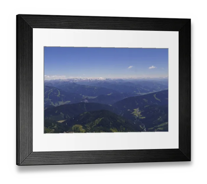 Framed Print : Sweeping views of mountain ranges and snow-capped peaks under a clear sky