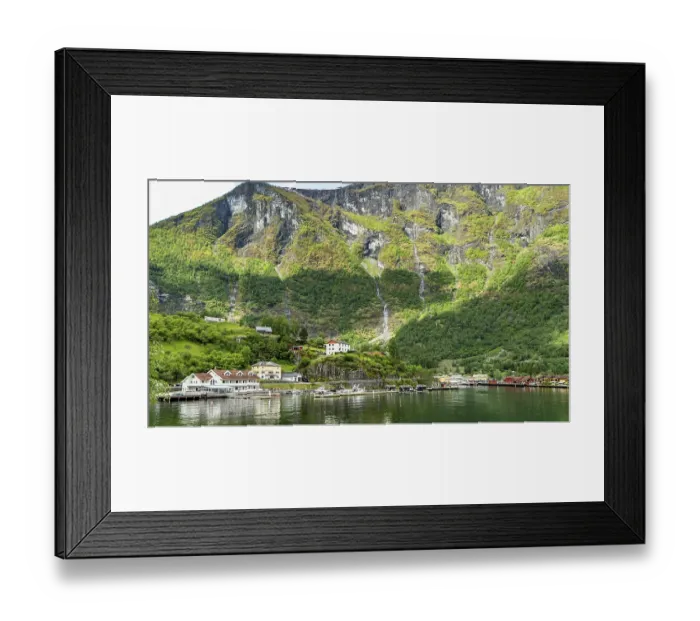 Framed Print : Flam village nestled beneath towering mountains on the Norwegian fjord Framed Print : Flam village nestled beneath towering mountains on the Norwegian fjord