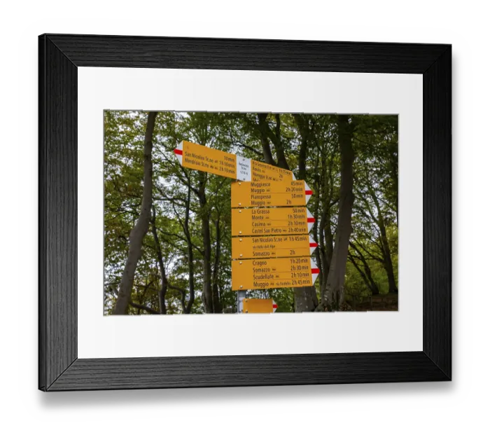 Framed Print : Hiking Sign Board with Distance and Direction in the Mountain in Monte Generoso Framed Print : Hiking Sign Board with Distance and Direction in the Mountain in Monte Generoso