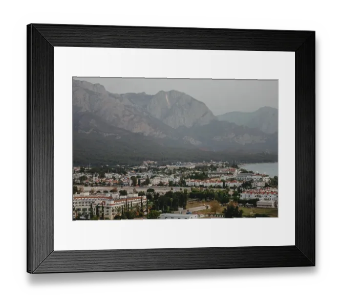 Framed Print : Panoramic view of mountains and coastline under an overcast sky Framed Print : Panoramic view of mountains and coastline under an overcast sky