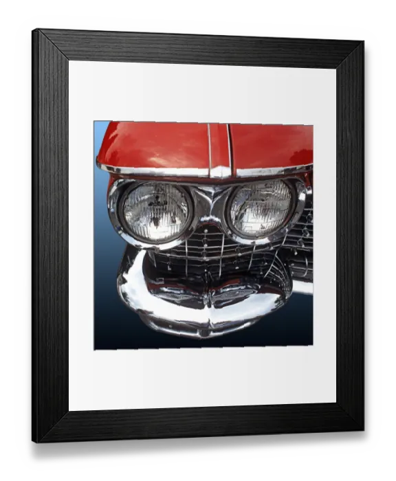 Framed Print : Close-up of twin headlights and bumper of an American road cruiser with red paintwork