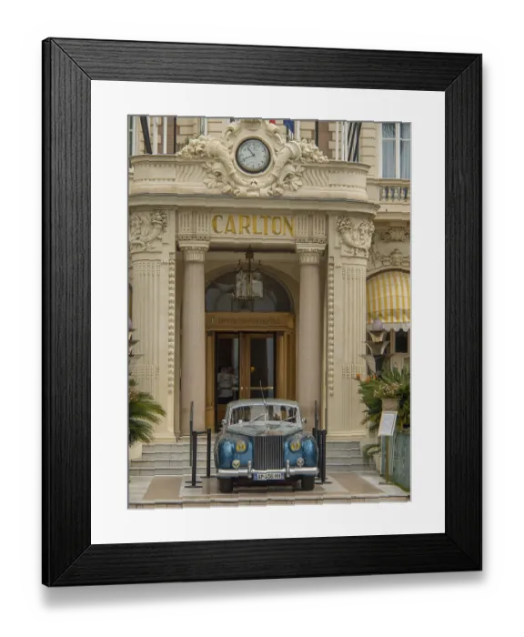 Framed Print : A classic car parked in front of the entrance of an elegant historic hotel Framed Print : A classic car parked in front of the entrance of an elegant historic hotel