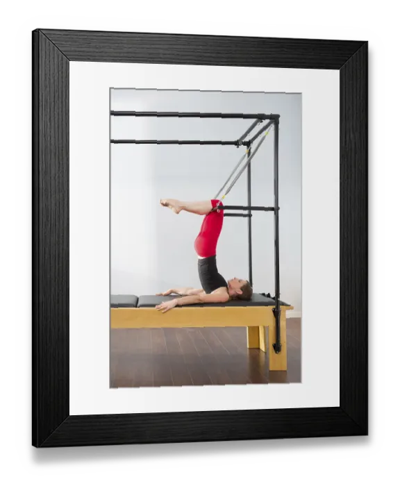 Framed Print : Aerobics pilates instructor woman in cadillac fitness exercise