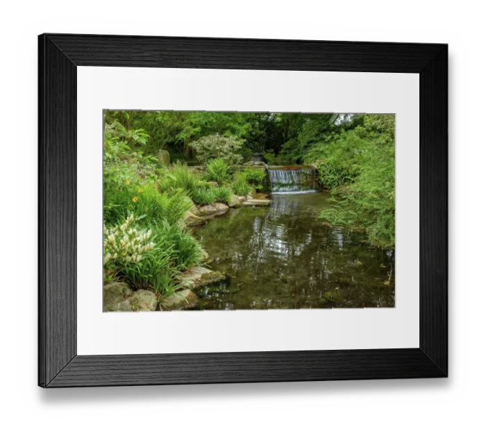 Framed Print : Artificial small water fall in japanese garden in Leverkusen Framed Print : Artificial small water fall in japanese garden in Leverkusen