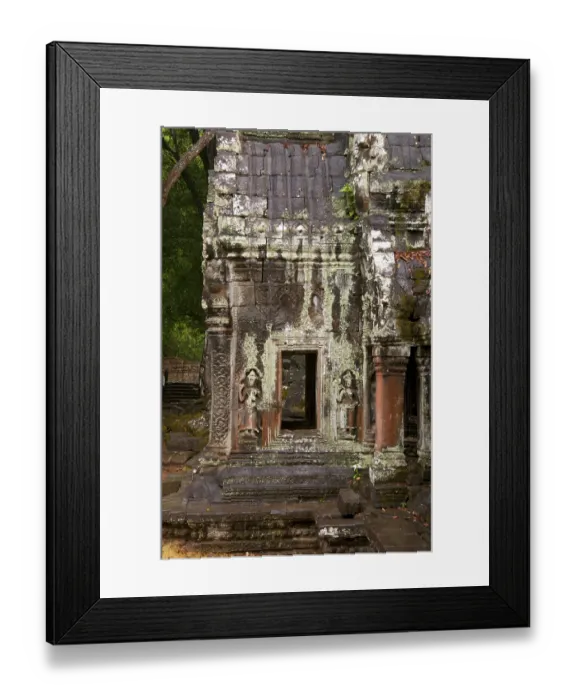 Framed Print : Ta Prohm was built in the Bayon style largely in the late 12th and early 13th centuries Framed Print : Ta Prohm was built in the Bayon style largely in the late 12th and early 13th centuries