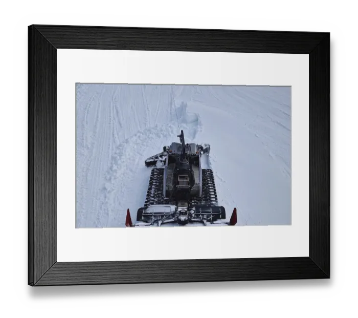 Framed Print : Aerial view of a snowcat working as leveling the snowdrifts on the slopes at Bansko ski resort in Bulgaria Framed Print : Aerial view of a snowcat working as leveling the snowdrifts on the slopes at Bansko ski resort in Bulgaria