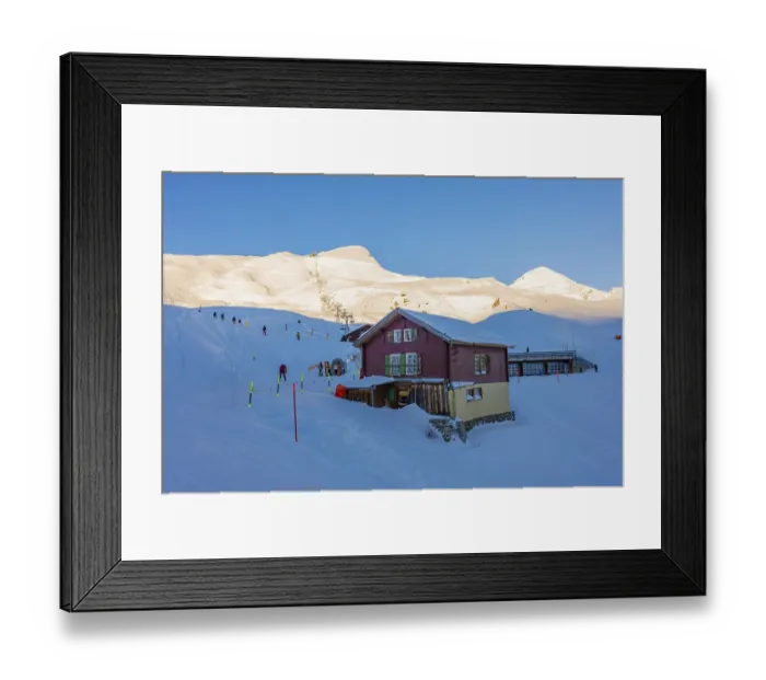 Framed Print : Ski Slope at 2061 Meters High Up and Overhead Cable Car and Mountain Peak in a Snowy Sunny Winter Day in Grindelwald Framed Print : Ski Slope at 2061 Meters High Up and Overhead Cable Car and Mountain Peak in a Snowy Sunny Winter Day in Grindelwald