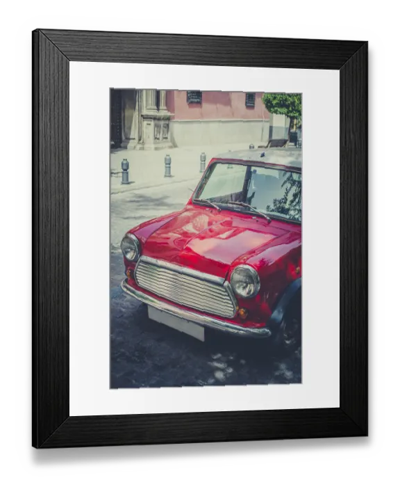 Framed Print : Vintage small red car on the street Framed Print : Vintage small red car on the street