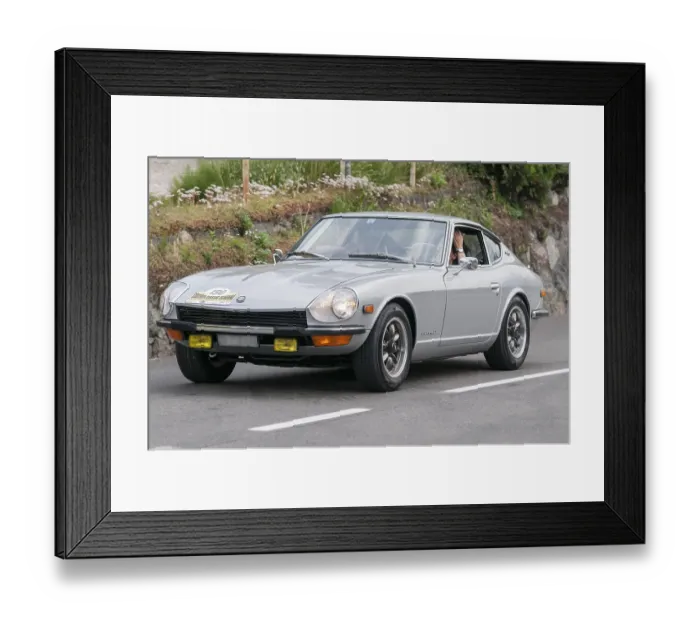 Framed Print : Laterally offset frontal view of the Datsun 240 Z with start number 130 Framed Print : Laterally offset frontal view of the Datsun 240 Z with start number 130