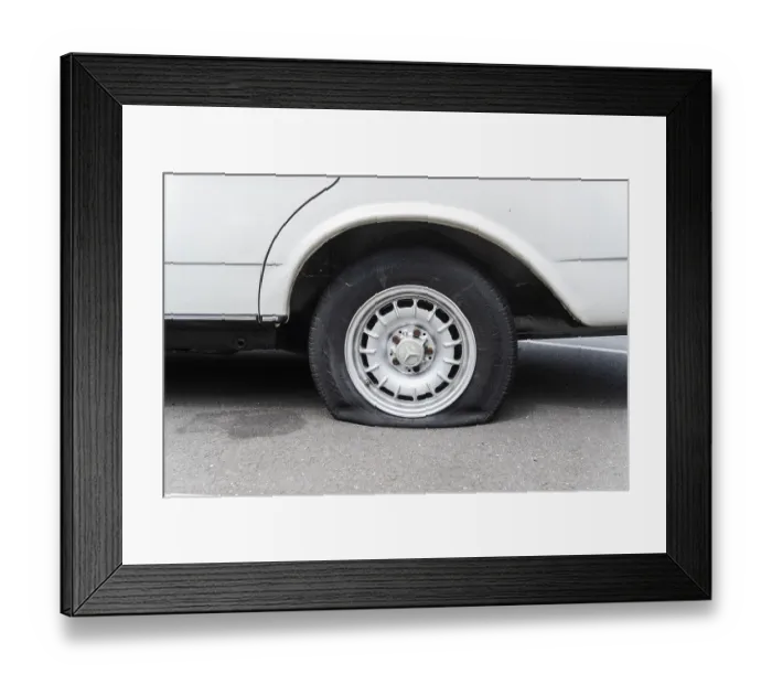 Framed Print : A flat tyre on a car, Wuppertal, Germany