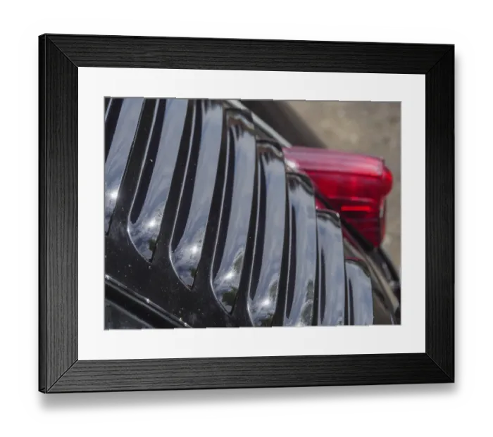 Framed Print : Close-up of a black vintage car