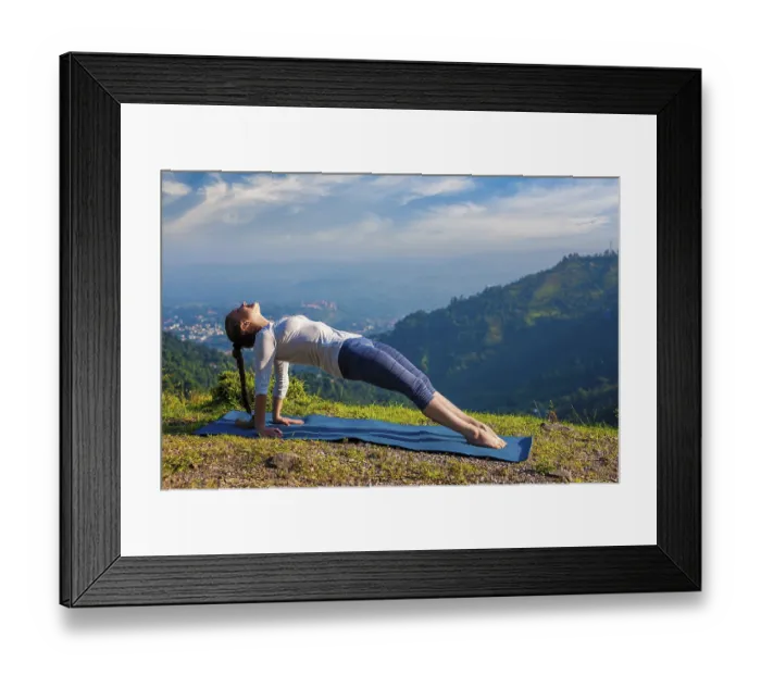Framed Print : Woman doing Hatha yoga asana Purvottanasana plank pose outdoors in mountains