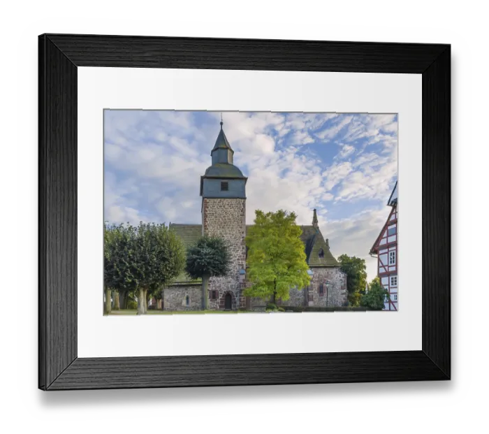 Framed Print : Medieval church in the small ancient town Trendelburg