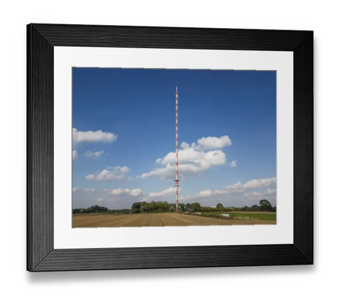 Framed Print : The broadcasting tower in the city of Wesel was erected in 1968 as a steel framework construction Framed Print : The broadcasting tower in the city of Wesel was erected in 1968 as a steel framework construction