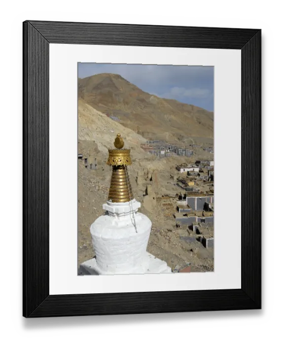 Framed Print : Tibetan Buddhism stupa with golden top traditional houses with grey