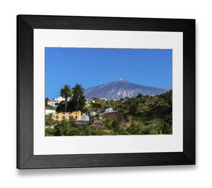 Framed Print : View of the Teide volcano from Icod de los Vinos on a sunny day with blue sky