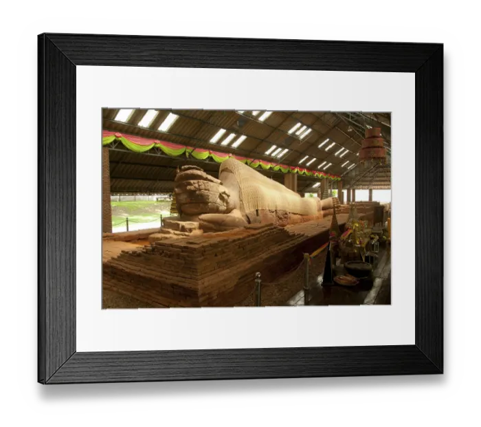 Framed Print : The sandstone reclining Buddha housed at Wat Dharmacakra Semaram is the oldest reclining Buddha in Thailand