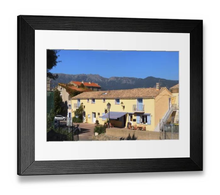 Framed Print : Village in landscape east coast Corsica France between mountains Framed Print : Village in landscape east coast Corsica France between mountains
