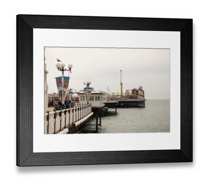 Framed Print : Walkway along Brighton Pier with amusement structures Framed Print : Walkway along Brighton Pier with amusement structures
