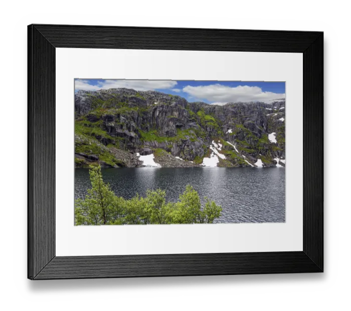 Framed Print : Large snowfields is reflected in the water of the lake