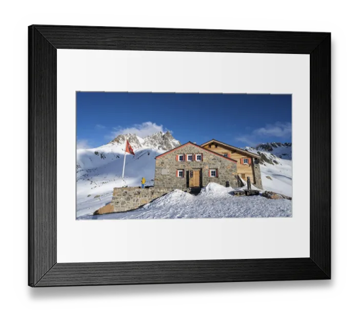 Framed Print : Chamanna d'Es-cha mountain hut in a wintry mountain landscape Framed Print : Chamanna d'Es-cha mountain hut in a wintry mountain landscape