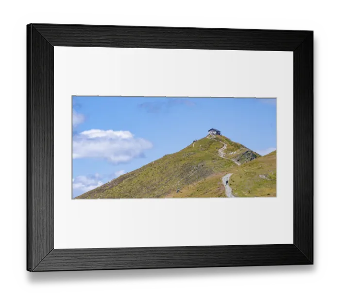 Framed Print : Helmhaus mountain hut on a mountain peak