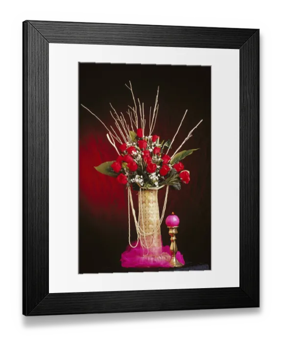 Framed Print : Bouquet, flowers arrangement of red roses with candle Framed Print : Bouquet, flowers arrangement of red roses with candle