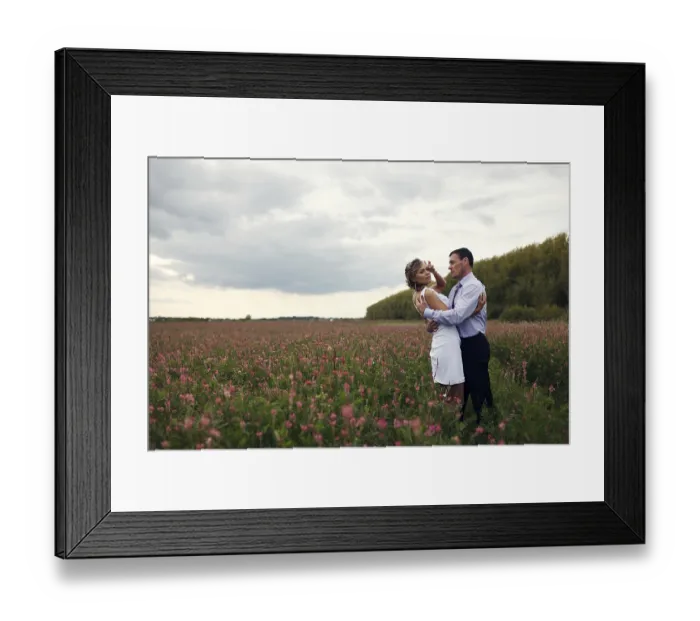 Framed Print : Newlyweds embraces outdoors. River on the background