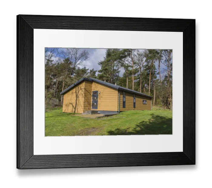 Framed Print : Rcreation bungalow in the middle of the forest between trees