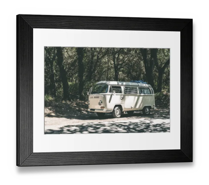 Framed Print : Vintage white bus camper on the road