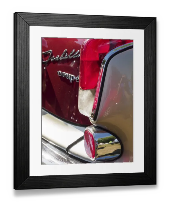 Framed Print : Rear view of a vintage car with red tail light and lettering Framed Print : Rear view of a vintage car with red tail light and lettering