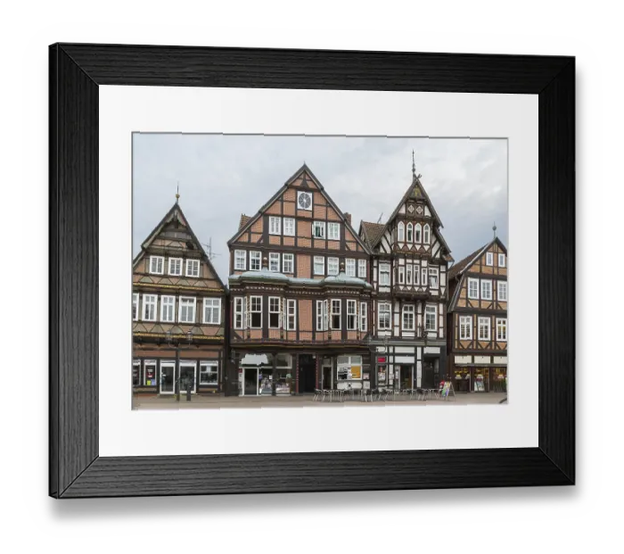 Framed Print : The street with historical half-timbered houses in the old city of Celle Framed Print : The street with historical half-timbered houses in the old city of Celle
