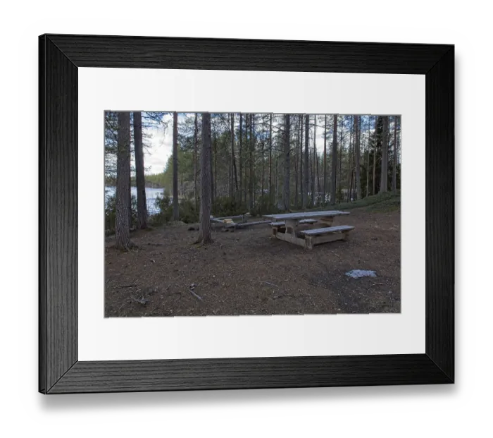 Framed Print : Camping area near lake shore in cloudy spring weather