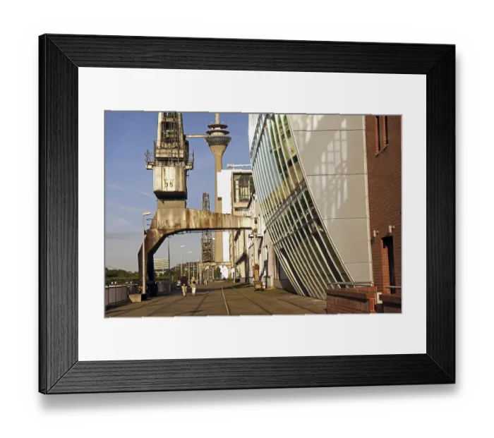 Framed Print : Old harbour crane and modern architecture