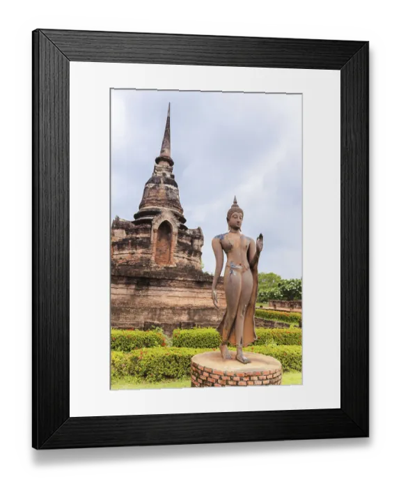 Framed Print : Standing buddha statue in sukhothai historical park