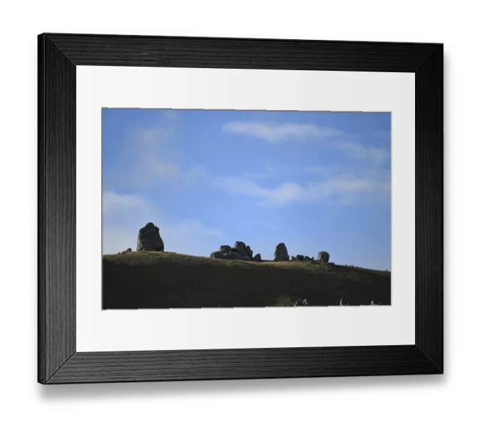 Framed Print : Cloud formations waft over the rocky landscape at Castle Hill