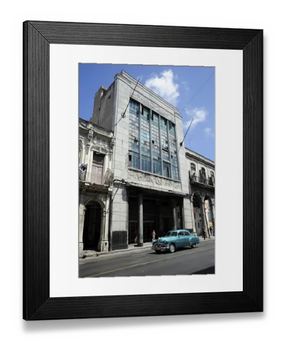 Framed Print : Blue 1950s vintage car in front of an Art Nouveau building on the Avenida Simon Bolivar