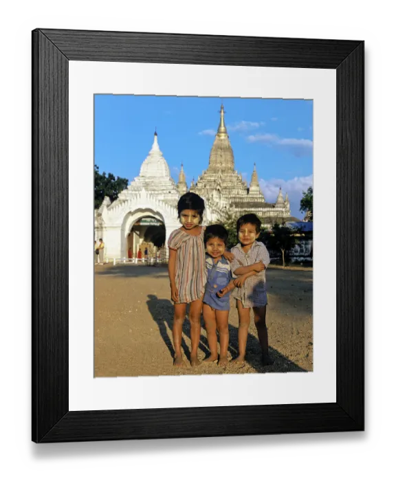 Framed Print : Children with Thanaka paste on their faces in front of Buddhist pagodas Framed Print : Children with Thanaka paste on their faces in front of Buddhist pagodas
