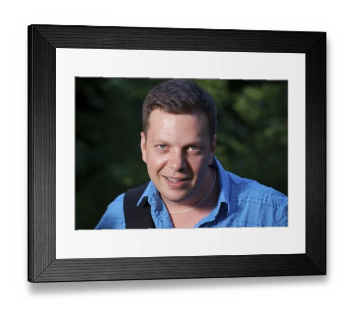 Framed Print : Young caucasian man portrait outdoor