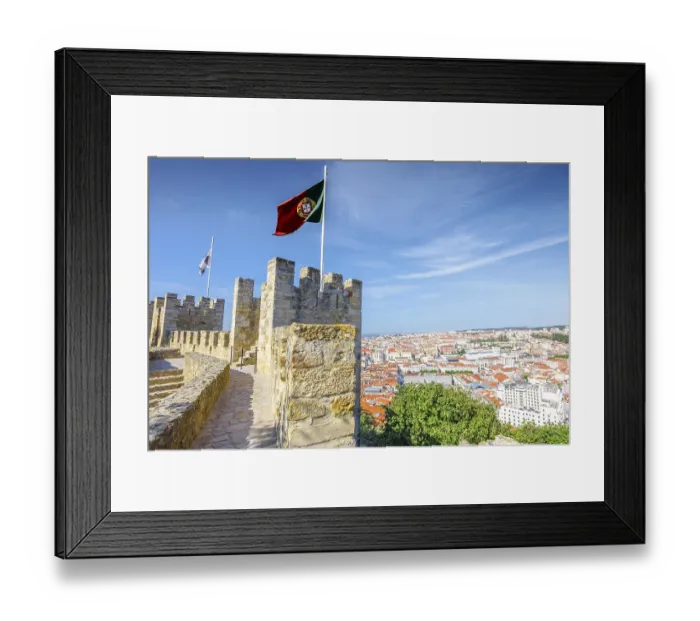 Framed Print : Portugal flag waving on ancient fortress wall of Sao Jorge Castle