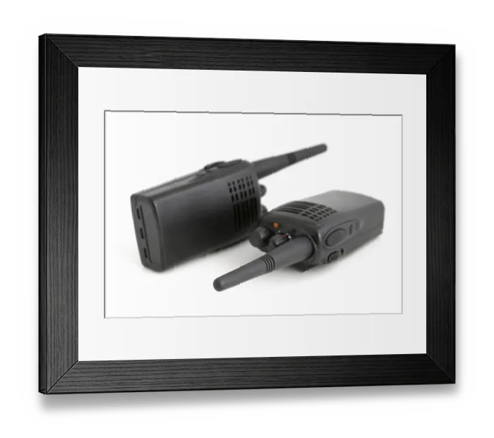 Framed Print : Pair of portable radio sets on a white background