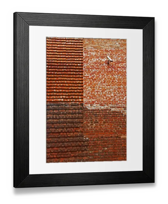 Framed Print : Detail of the restored medieval brick walls