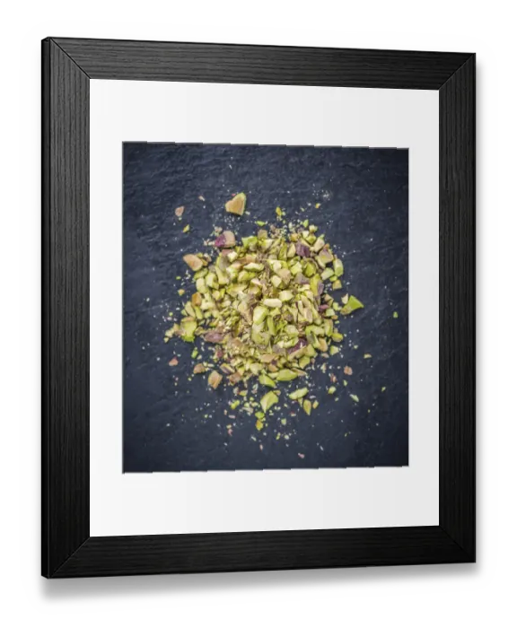 Framed Print : Portion of minced Pistachios (detailed close-up shot)